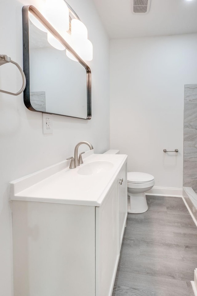 117 Apollo Ct W, Antioch, TN 37013 - full bath with vanity, toilet, baseboards, wood finished floors, and visible vents