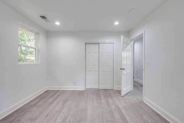 117 Apollo Ct W, Antioch, TN 37013 - unfurnished bedroom featuring visible vents, baseboards, a closet, light wood-style floors, and recessed lighting