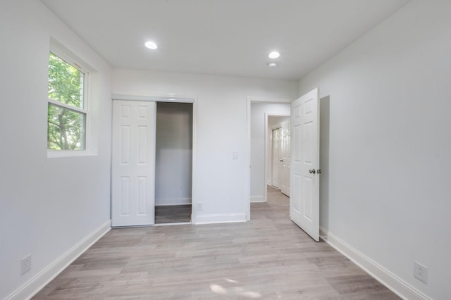 117 Apollo Ct W, Antioch, TN 37013 - unfurnished bedroom featuring recessed lighting, baseboards, a closet, and light wood-style floors