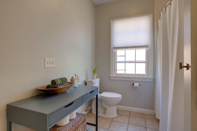 231 Westchase Dr, Nashville, TN 37205 - bathroom featuring tile patterned floors, baseboards, toilet, and curtained shower