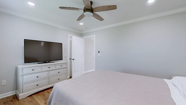 bedroom with recessed lighting, ceiling fan, light wood finished floors, baseboards, and crown molding
