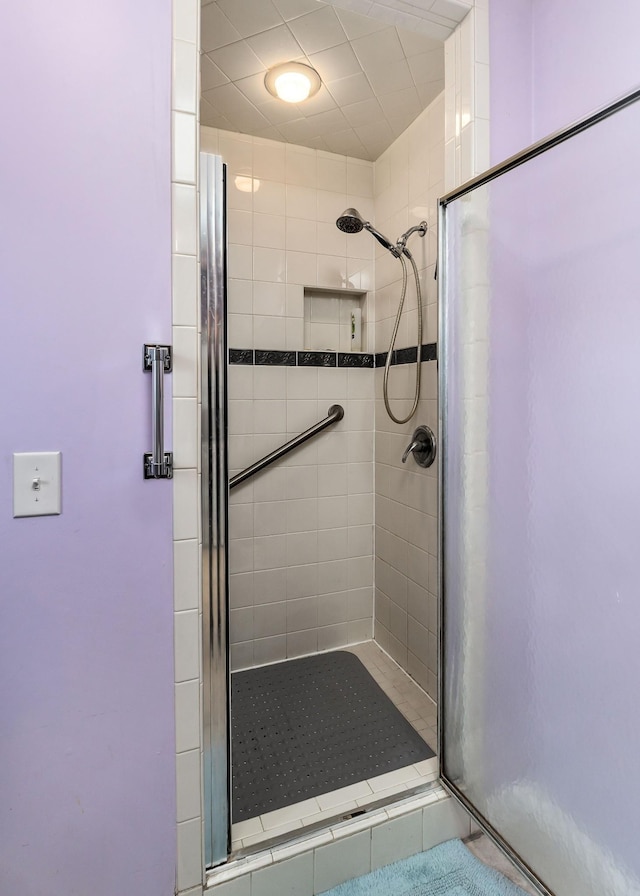 bathroom featuring a shower stall