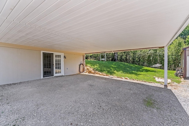 view of patio / terrace with an attached carport