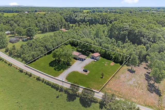 bird's eye view featuring a forest view