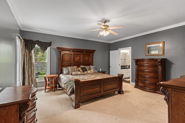 bedroom with light colored carpet, crown molding, and ensuite bath