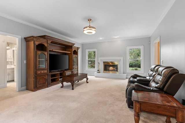 living area with crown molding, baseboards, and light carpet
