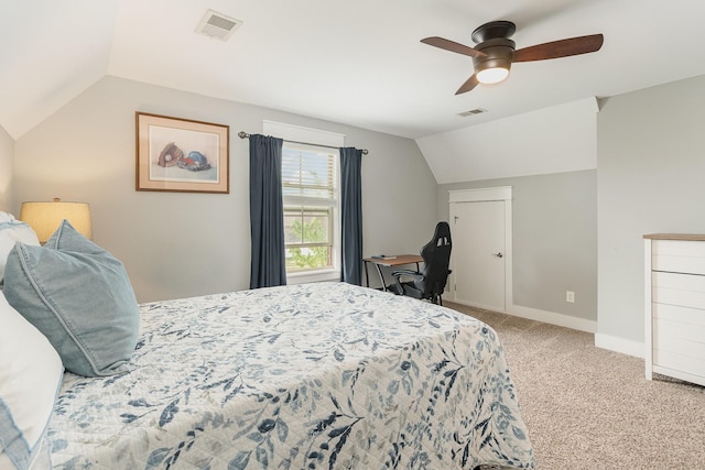 bedroom with visible vents, carpet flooring, a ceiling fan, and vaulted ceiling