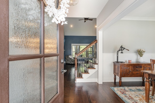 foyer entrance with recessed lighting, wood-type flooring, ceiling fan with notable chandelier, and stairs