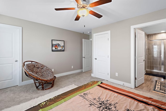 carpeted bedroom with baseboards and a ceiling fan