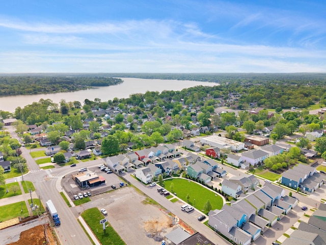 birds eye view of property featuring a water view and a residential view