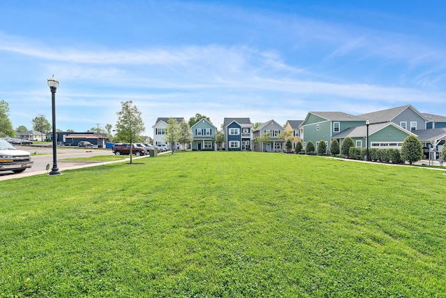 view of yard with a residential view