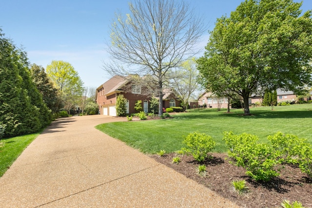 1136 Haverhill Dr, Brentwood, TN 37027 - view of front of home featuring driveway, a front yard, and brick siding