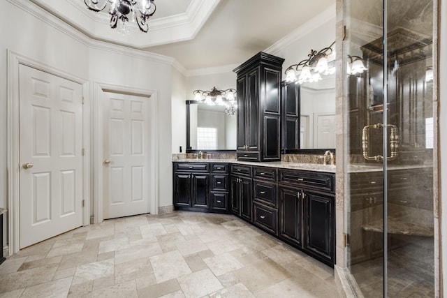 1136 Haverhill Dr, Brentwood, TN 37027 - full bathroom with a chandelier, double vanity, ornamental molding, a shower stall, and stone finish floors
