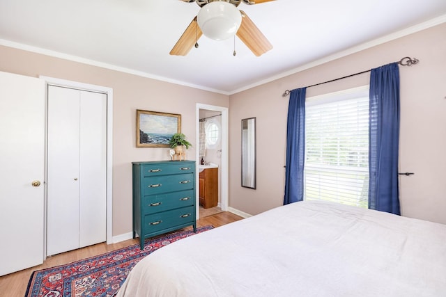 bedroom with light wood-style floors, baseboards, crown molding, and a ceiling fan