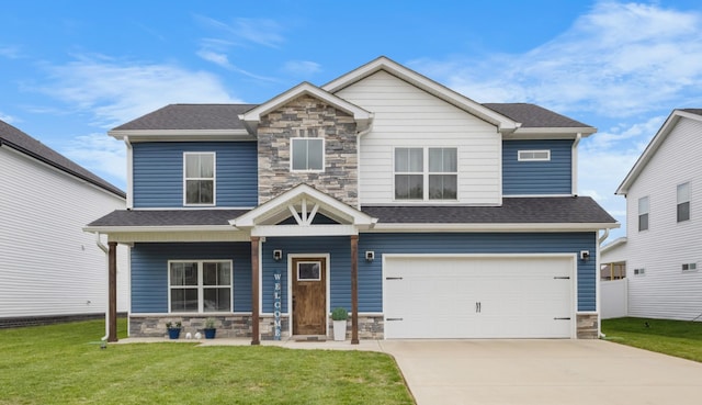 229 Kildeer Dr, Clarksville, TN 37040 - craftsman inspired home featuring a porch, a front yard, concrete driveway, an attached garage, and stone siding