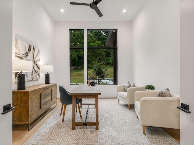 office space featuring a ceiling fan, recessed lighting, and light wood-type flooring