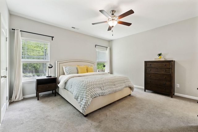 411 Barbaro Ct, Burns, TN 37029 - bedroom featuring carpet flooring, baseboards, visible vents, and multiple windows
