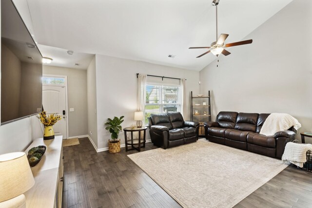 411 Barbaro Ct, Burns, TN 37029 - living room featuring ceiling fan, dark wood-type flooring, lofted ceiling, and a wealth of natural light