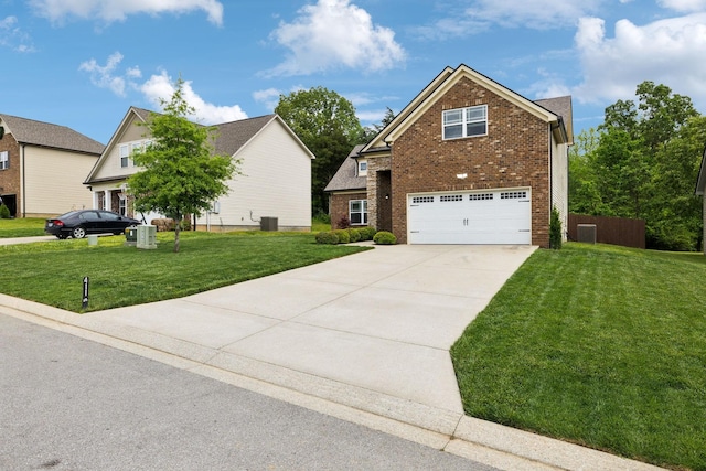 411 Barbaro Ct, Burns, TN 37029 - view of front of property featuring a garage, concrete driveway, a front yard, and brick siding