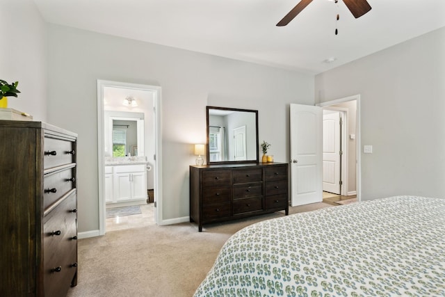 411 Barbaro Ct, Burns, TN 37029 - bedroom with baseboards, ensuite bathroom, light carpet, and a ceiling fan