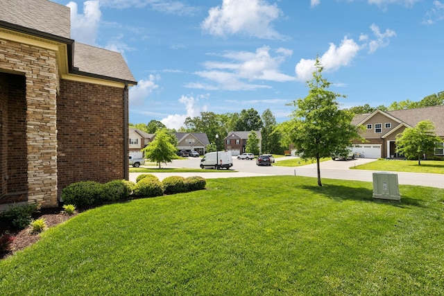411 Barbaro Ct, Burns, TN 37029 - view of yard with a residential view and concrete driveway