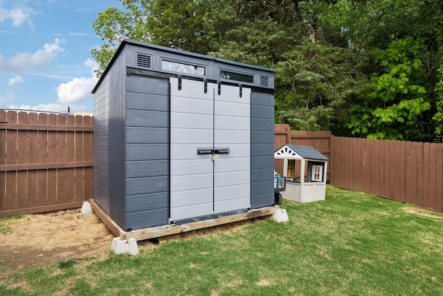 411 Barbaro Ct, Burns, TN 37029 - view of shed with a fenced backyard