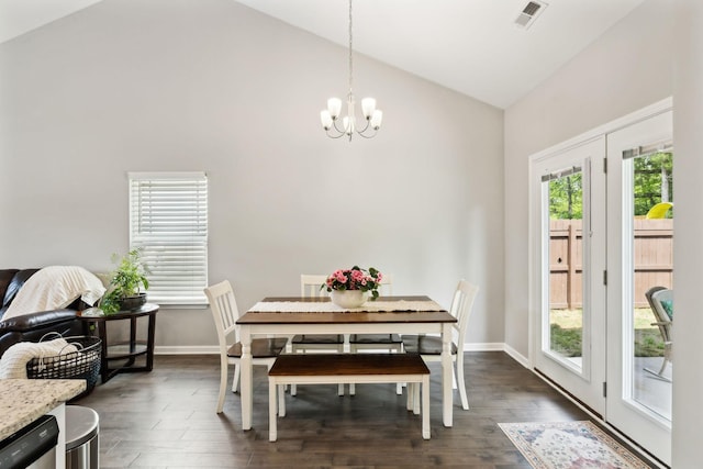 411 Barbaro Ct, Burns, TN 37029 - dining space with an inviting chandelier, high vaulted ceiling, dark wood finished floors, baseboards, and visible vents