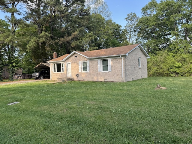 single story home featuring crawl space, a chimney, brick siding, a front lawn, and a shingled roof