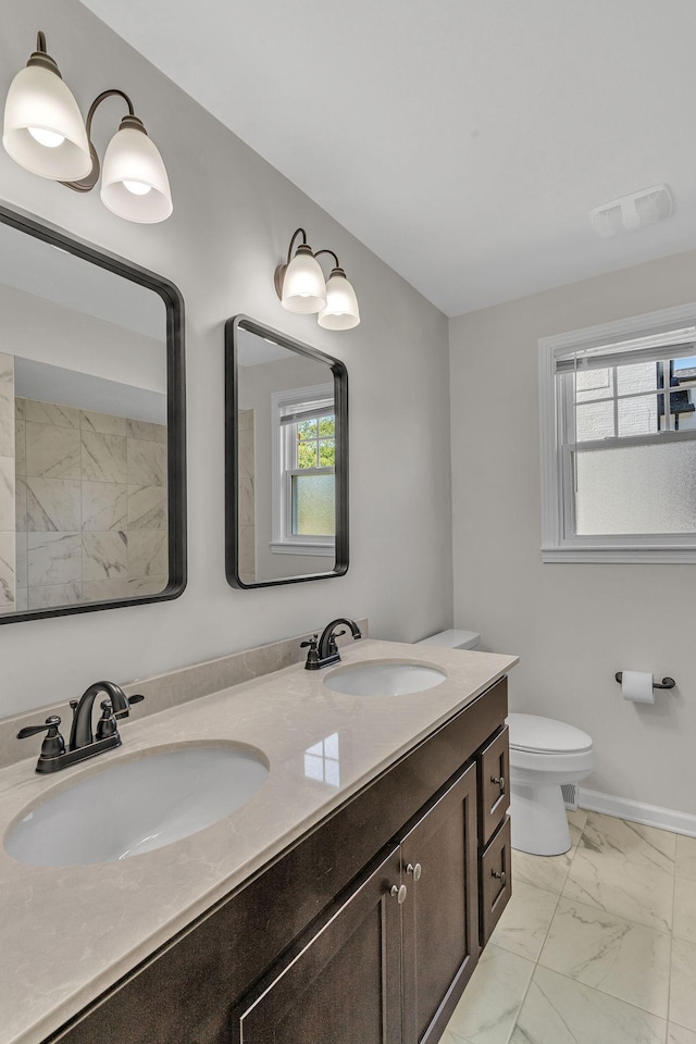 4043 Marydale Dr, Nashville, TN 37207 - bathroom with visible vents, a sink, marble finish floor, and toilet