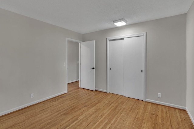 4043 Marydale Dr, Nashville, TN 37207 - unfurnished bedroom with baseboards, wood finished floors, and a closet