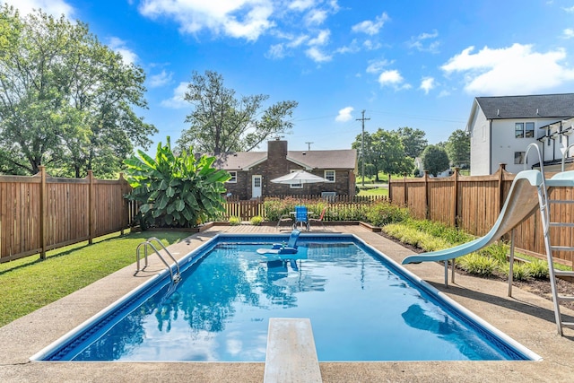 4043 Marydale Dr, Nashville, TN 37207 - view of swimming pool featuring a fenced backyard, a fenced in pool, a water slide, and a diving board