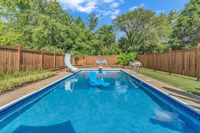 4043 Marydale Dr, Nashville, TN 37207 - view of pool with a water slide, a fenced backyard, and a fenced in pool