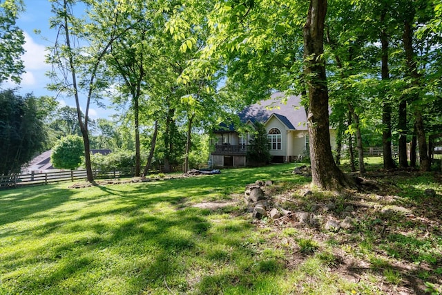 view of yard featuring fence