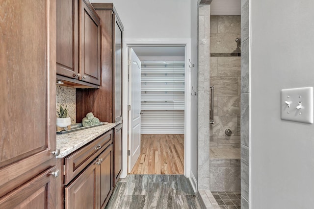 1012 Carrs Creek Blvd, Greenbrier, TN 37073 - bathroom featuring a tile shower and vanity