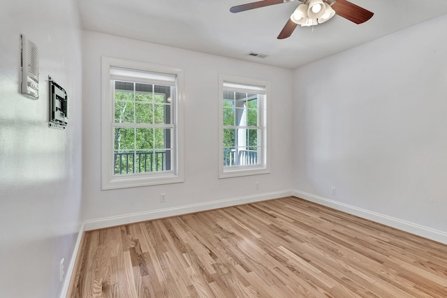 1012 Carrs Creek Blvd, Greenbrier, TN 37073 - spare room with baseboards, a ceiling fan, light wood-style flooring, and visible vents