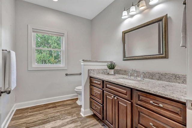 1012 Carrs Creek Blvd, Greenbrier, TN 37073 - bathroom with toilet, baseboards, and vanity