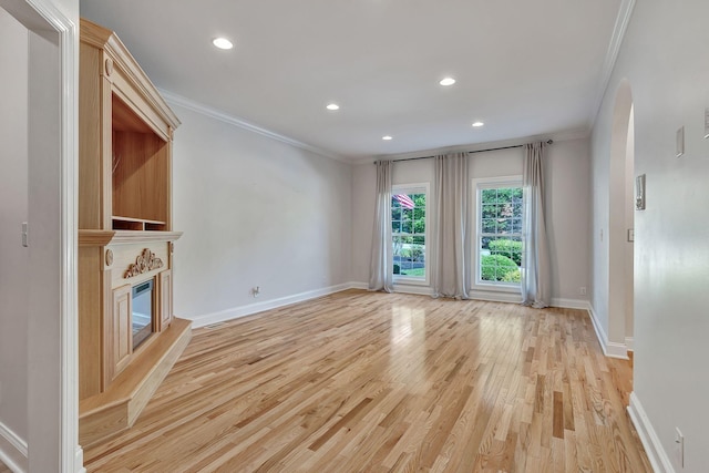 1012 Carrs Creek Blvd, Greenbrier, TN 37073 - unfurnished living room featuring recessed lighting, ornamental molding, baseboards, and light wood-style flooring