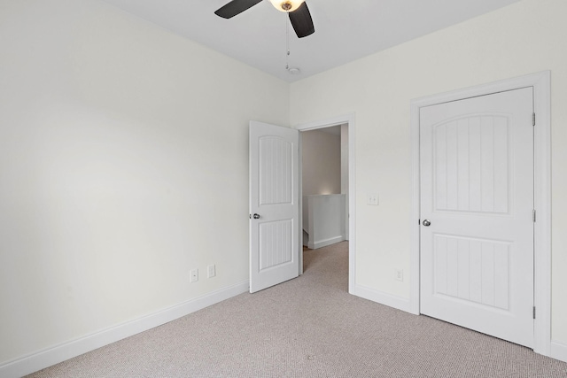 4325 Ashland City Hwy Unit 8, Nashville, TN 37218 - unfurnished bedroom with baseboards, a ceiling fan, and carpet flooring