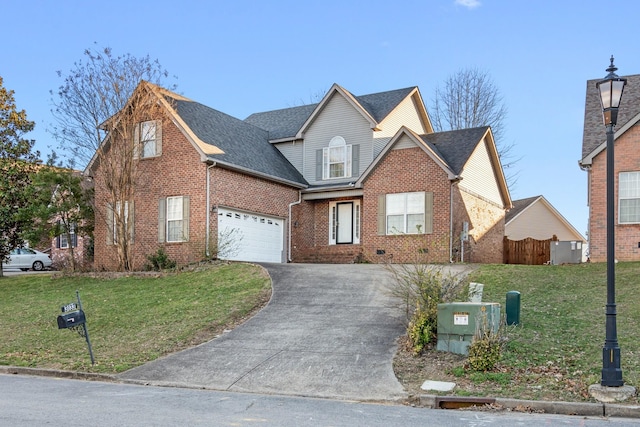 traditional-style home featuring a garage, driveway, a front lawn, and brick siding