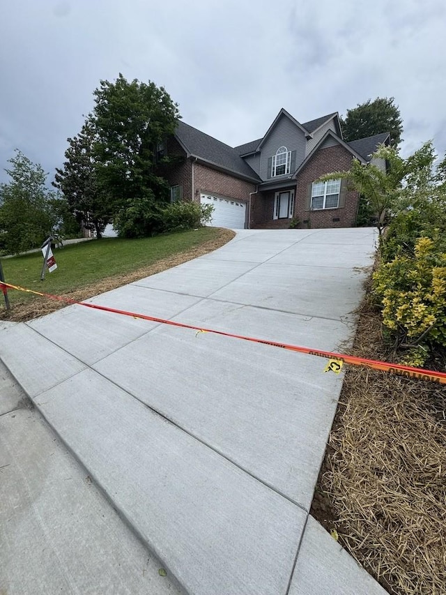 3033 Summercrest Trl, Antioch, TN 37013 - traditional-style home featuring brick siding, driveway, a garage, and a front yard