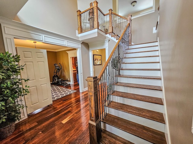 2971 Ownby Rd, Lewisburg, TN 37091 - stairway with a towering ceiling and hardwood / wood-style floors