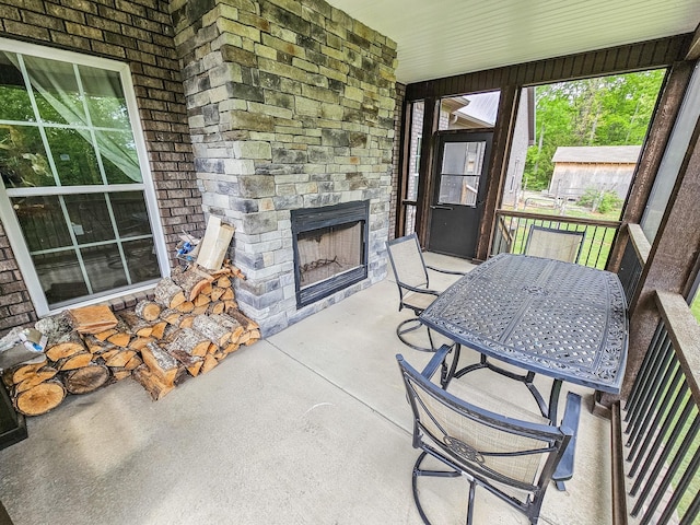 2971 Ownby Rd, Lewisburg, TN 37091 - sunroom with a fireplace and a wealth of natural light