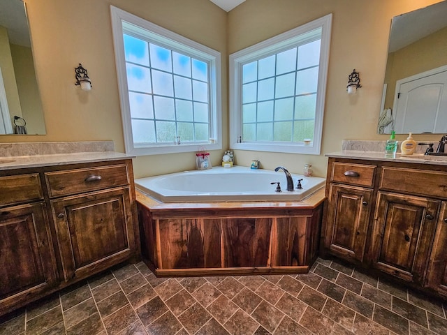 2971 Ownby Rd, Lewisburg, TN 37091 - bathroom featuring a sink, a garden tub, and two vanities