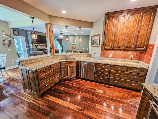 2971 Ownby Rd, Lewisburg, TN 37091 - kitchen featuring ceiling fan, dark wood-style flooring, a fireplace, dishwasher, and a sink