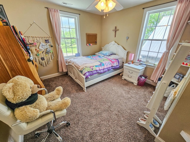 2971 Ownby Rd, Lewisburg, TN 37091 - bedroom with baseboards, visible vents, multiple windows, and dark carpet