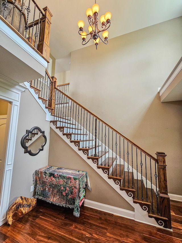 2971 Ownby Rd, Lewisburg, TN 37091 - staircase with an inviting chandelier, baseboards, and wood finished floors