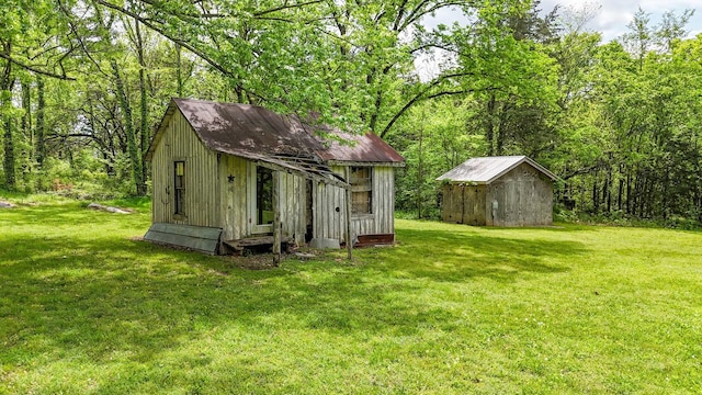 2971 Ownby Rd, Lewisburg, TN 37091 - view of shed featuring a forest view