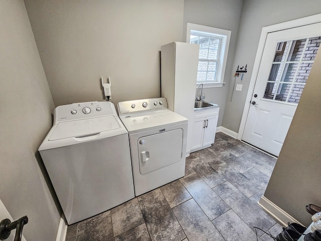 2971 Ownby Rd, Lewisburg, TN 37091 - laundry room with a sink, baseboards, cabinet space, and washing machine and clothes dryer