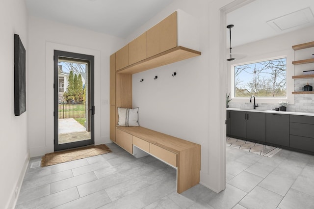 6120 Bresslyn Rd, Nashville, TN 37205 - mudroom featuring a sink and baseboards
