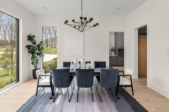6120 Bresslyn Rd, Nashville, TN 37205 - dining room with plenty of natural light, light wood finished floors, and a chandelier
